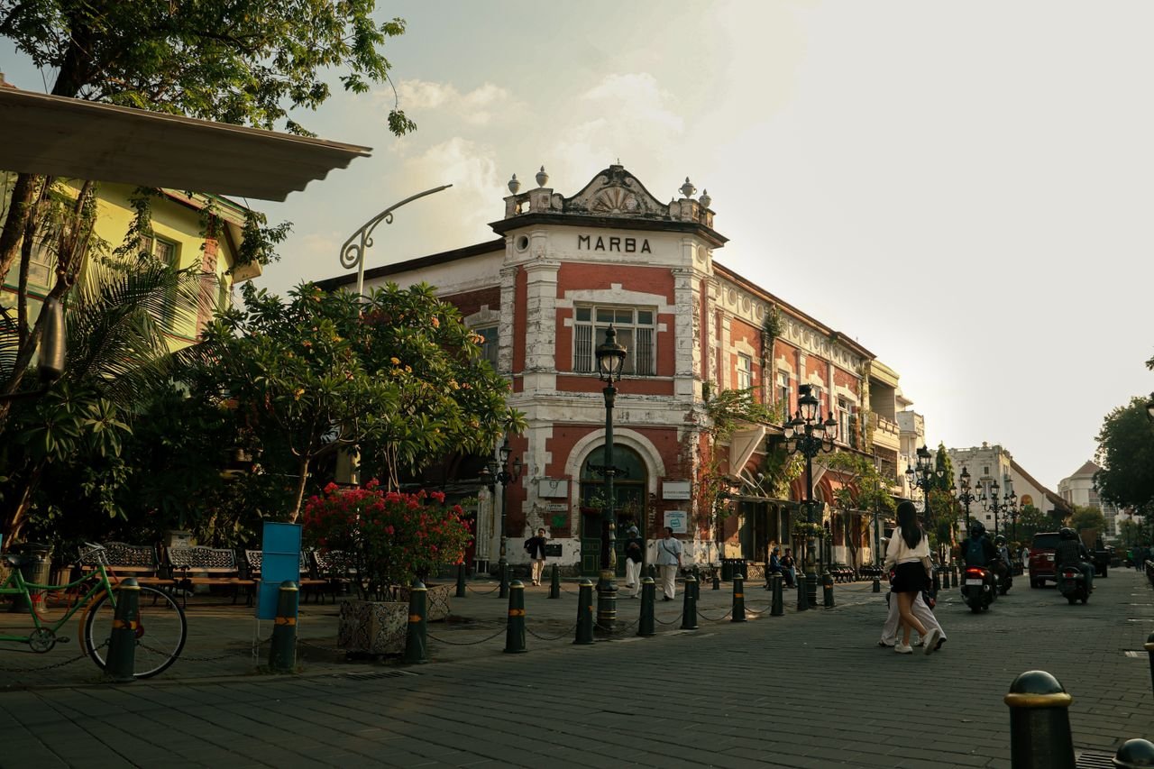 services-02 Scenic view of Marba Building in Semarang, Indonesia, capturing colonial architecture at dusk.