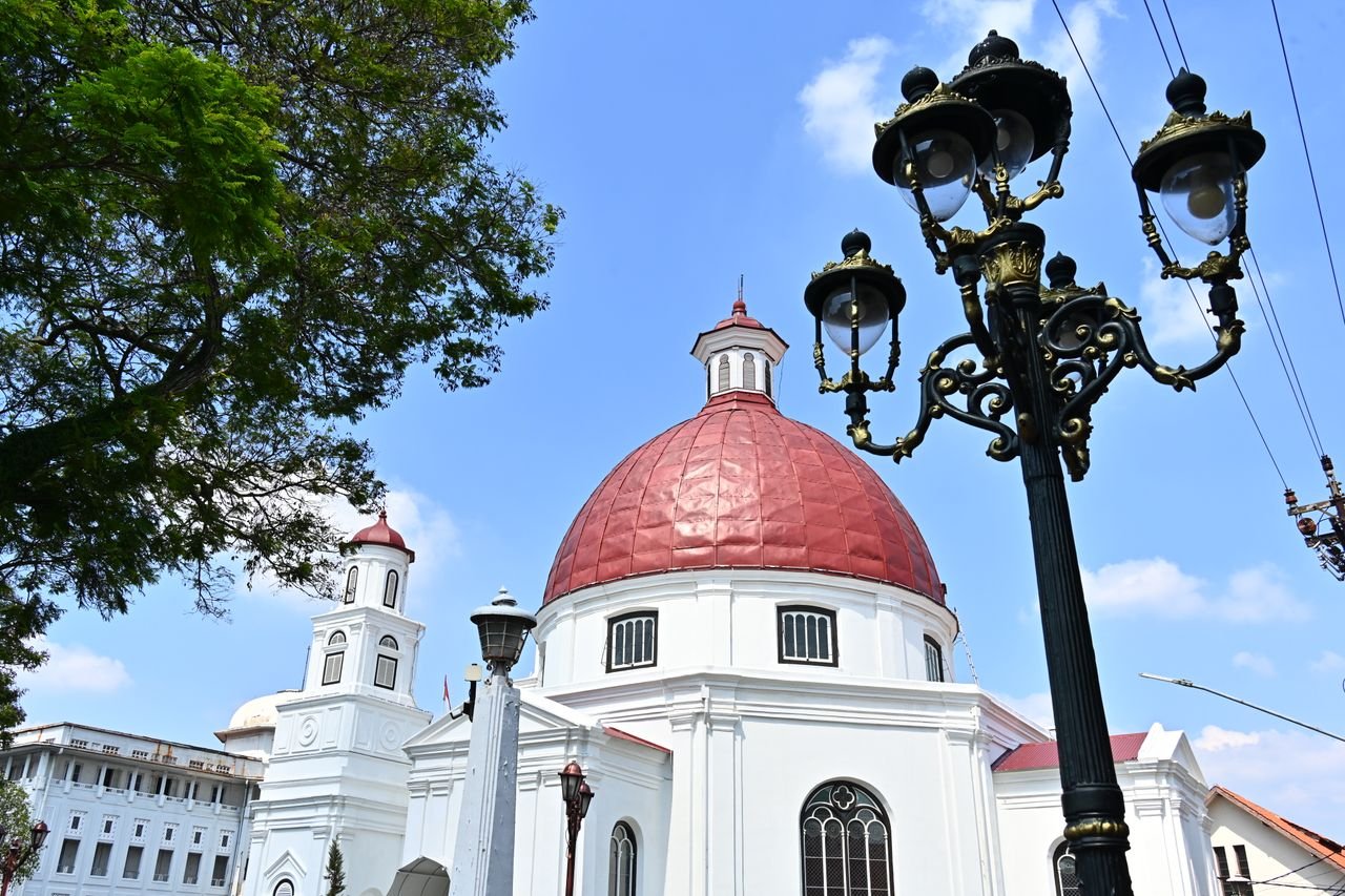 Historic Protestant church with a distinct red dome located in Semarang, Central Java, Indonesia.