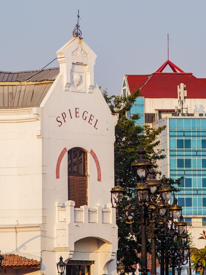 View of the iconic Spiegel building in Semarang, showcasing classic colonial architecture.